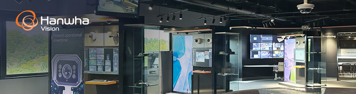 A variety of surveillance cameras displayed at an exhibition.